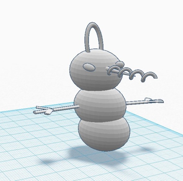 A snowman ornament designed by Will's 6-year-old son