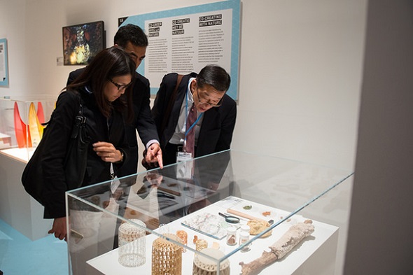 Visitors look at the CaCO3 Stoneware pieces by Laura Lynn Jansen and Thomas Vailly. © Wim Gombeer