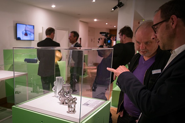 One room of the exhibit reveals how 3D printing changes manufacturing processes. © Wim Gombeer