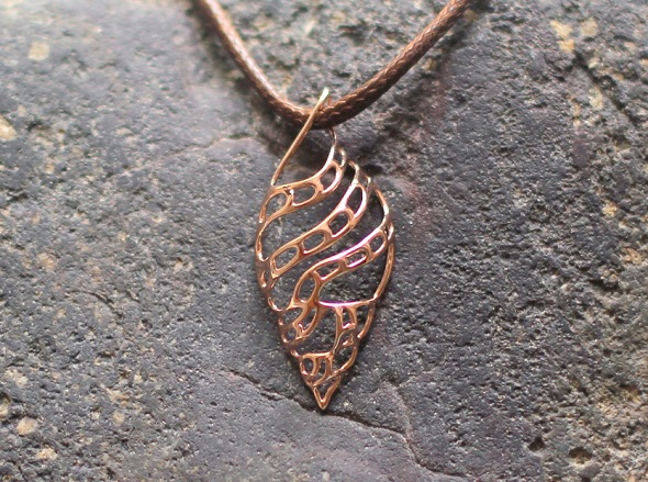 Tulip Shell Pendant by Vulcan Jewelry. Printed in 14k red gold.