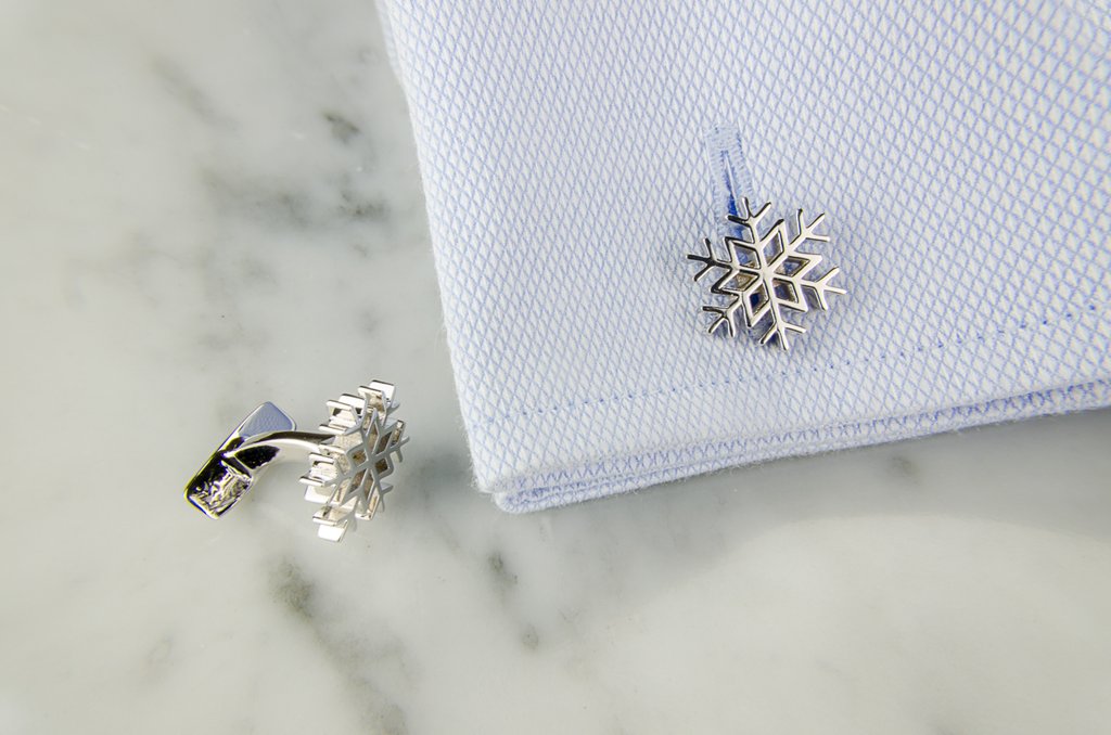3D-printed customized cufflinks in the shape of snowflakes