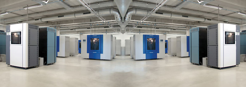 A panoramic image of the industrial FDM machines at Materialise.