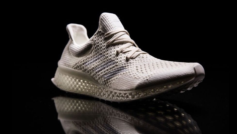 A white sports shoe - the adidas Futurecraft.