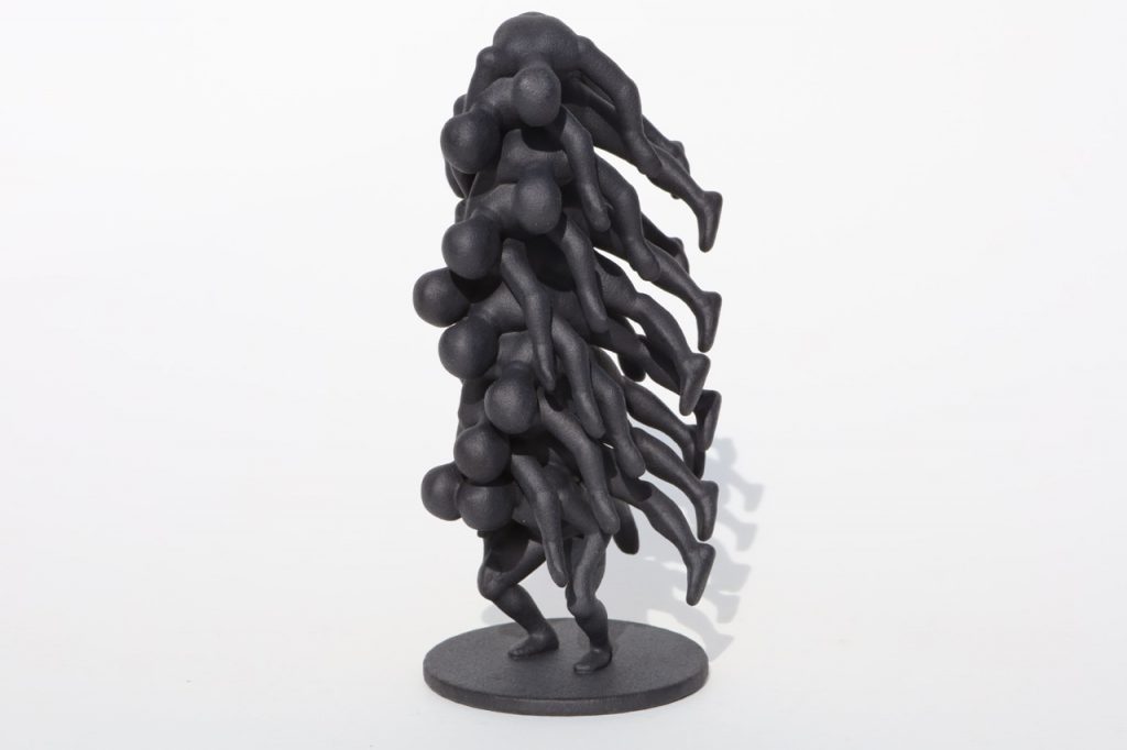 A 3D-printed sculpture of a human figure carrying nine others on its back