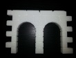 Dungeon wall with two small doorways