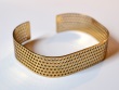 PERFORATED GOLD-PLATED BRACELET