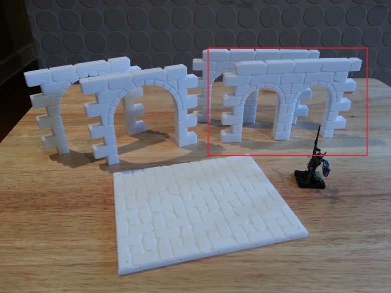 Dungeon wall with two small doorways