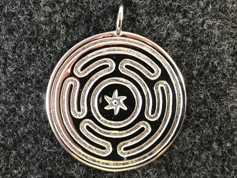 Hecate's Labyrinth pendant in rhodium-plated polished brass.
