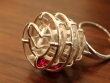 Kinetic Ring - Rolling rubies with every movement of the wearer